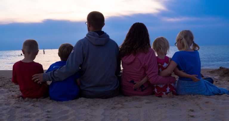 Laura Griffis and her family watching the sunset